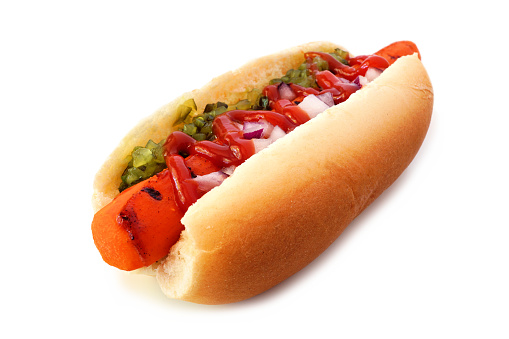 Carrot vegan hot dog with relish, ketchup and onions isolated on white