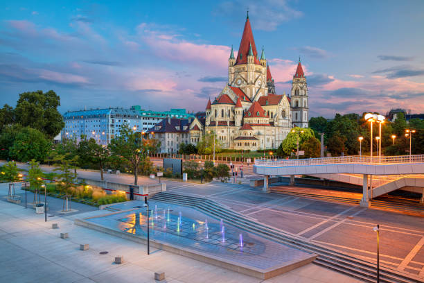 Vienna, Austria. Cityscape image of Vienna capital city of Austria with St. Francis of Assisi Church during beautiful sunset. vienna austria stock pictures, royalty-free photos & images