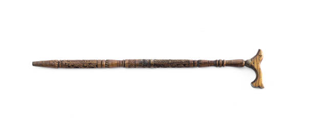 istock handmade wooden walking stick on white 1166855828