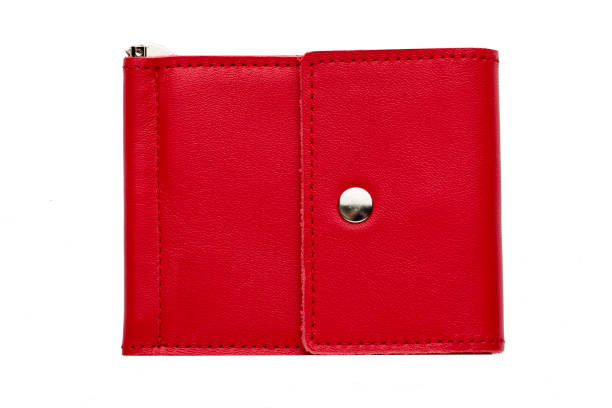 istock Red leather purse on a white background close-up.Compact wallet 1166857009