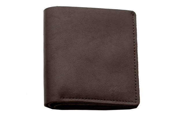 istock Brown male purse on a white background.Compact wallet 1166857089