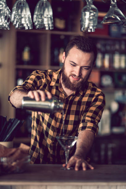 istock Pouring The Liquor In The Cocktail 1166861639