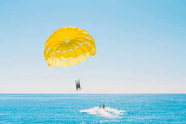 Delight of people from parasailing flight - incredible impressions of the freedom of soaring and amazing view from the height