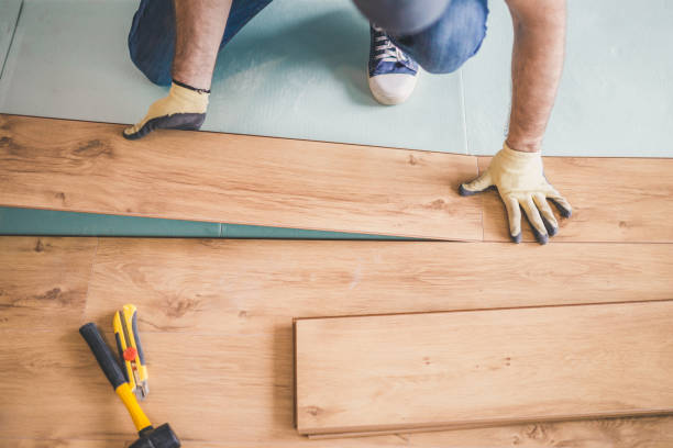 istock The master professionally puts laminate flooring 1166866774