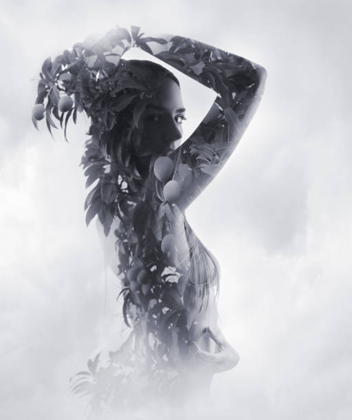 istock Multiple Exposure of young woman morphing into Mango tree 1166866905
