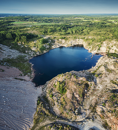 Aerial view of abandoned open pit gypsum mine.