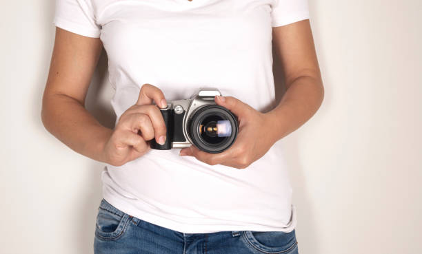 istock Woman with Camera 1166873660