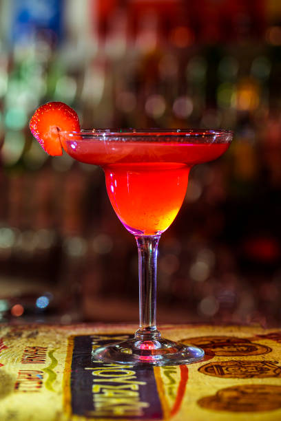 istock Red Tequila Sunrise with Strawberries 1166873683
