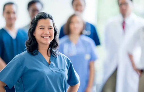 Team of caring doctors and nurses at the hospital.