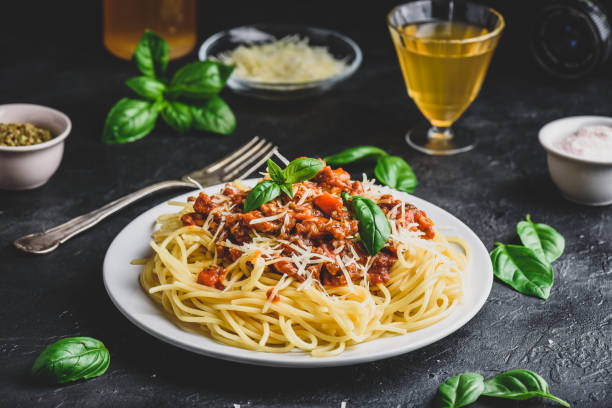 istock Spaghetti with bolognese sauce and parmesan cheese 1166875955