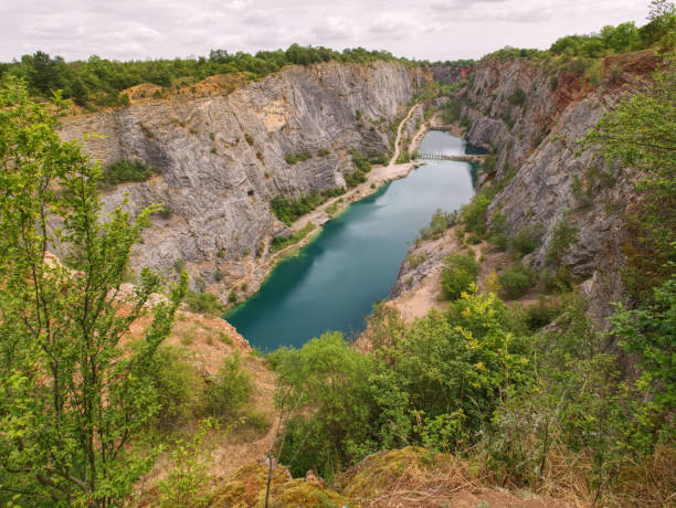 istock Velka Amerika is dolomite quarry for cement production. 1166878191
