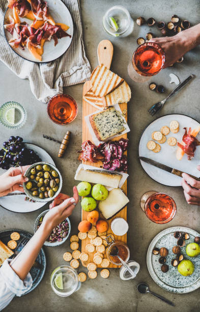 80+ People Eating Charcuterie Board Stock Photos, Pictures & Royalty ...