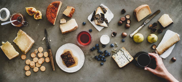 istock Wine and snack variety over grey backgorund, wide composition 1166881722