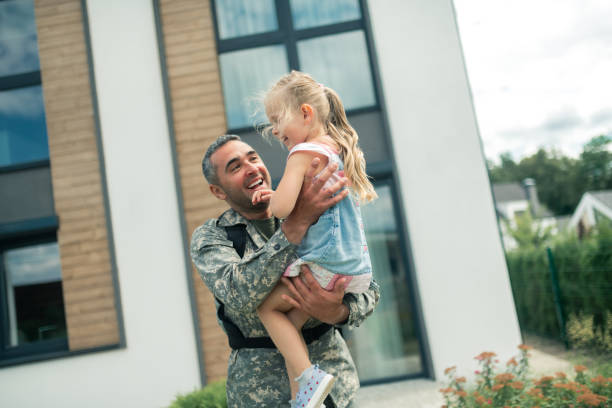 istock Cute little girl feeling amazing while seeing her father 1166882960