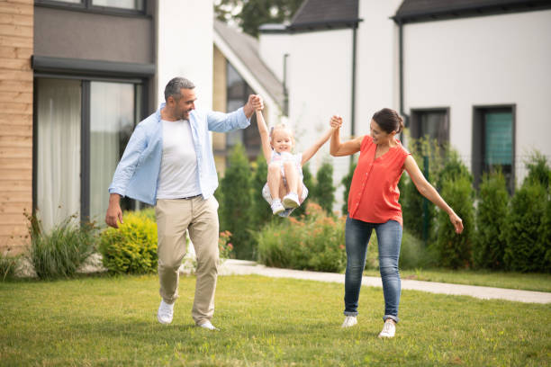 istock Cheerful daughter feeling happy having fun with parents 1166883025