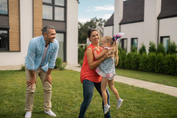 istock Daughter feeling entertained having fun with parents 1166883139