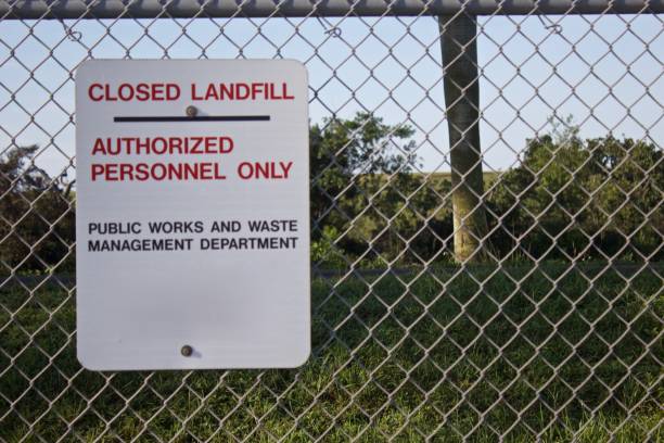 istock Closed Landfill sign on chain link fence 1166884678