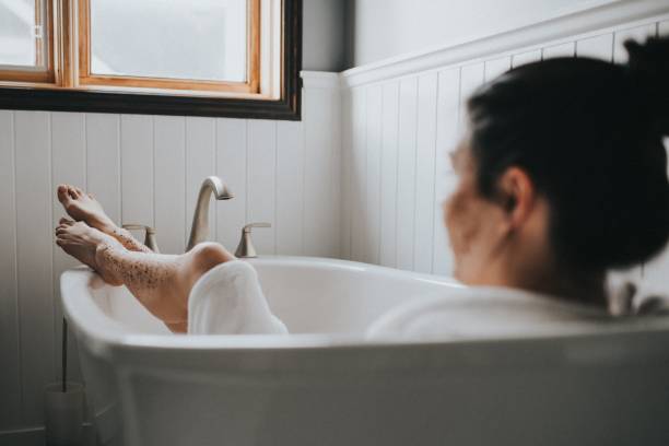 istock Woman in Bathtub with Body Scrub 1166888418