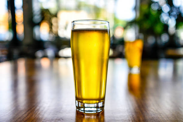 istock Craft Beer in Glass at Brewery with Bokeh Background 1166891093