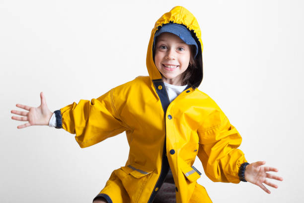 istock Builder thumb up. The kid is dressed as a builder. Future profession. Career guidance. Happy successful builder. Career. Business in the construction industry. The property. Child game. 1166891427