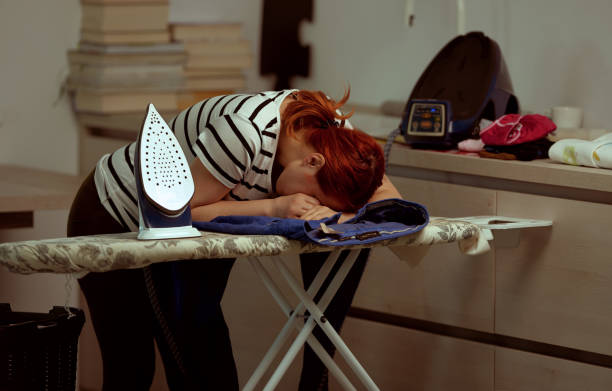 istock Exhausted - can't iron clothes anymore! 1166891495