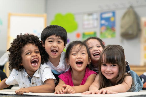 istock Group of smiling preschool students 1166891669