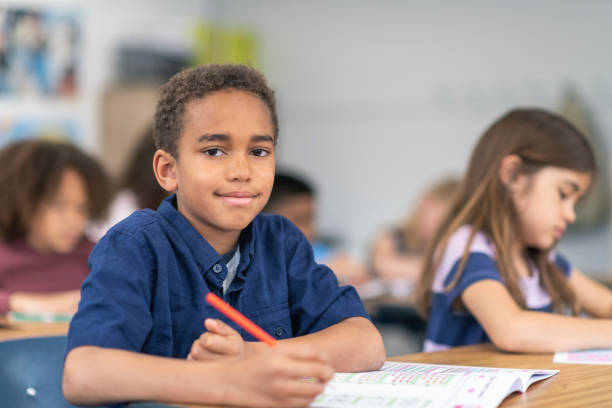 istock Portrait of a smiling student in class 1166891814
