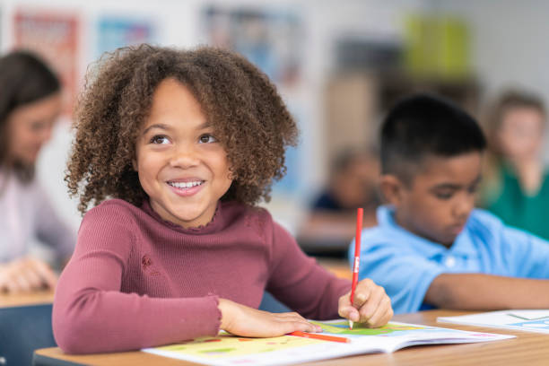 istock Portrait of a smiling student in class 1166891853