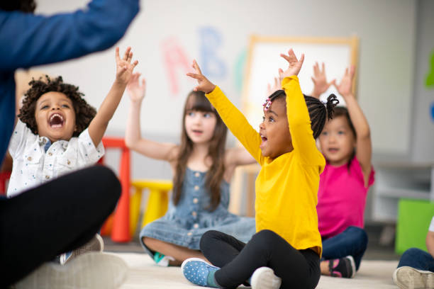 istock Multi-ethnic group of preschool students in class 1166892022
