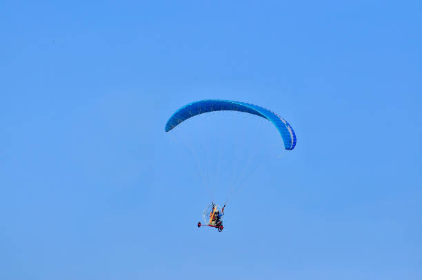 istock Paragliding in the sky 1166894167