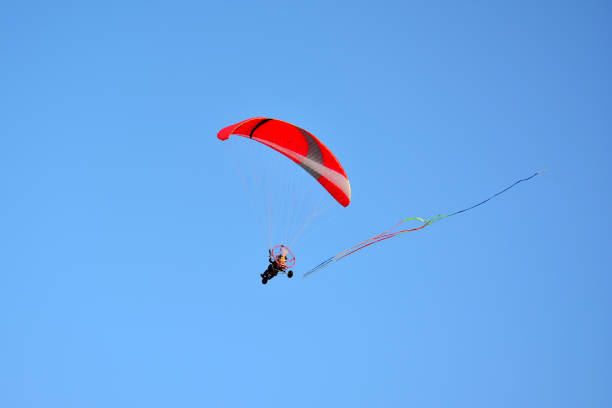 istock Paragliding in the sky 1166894196