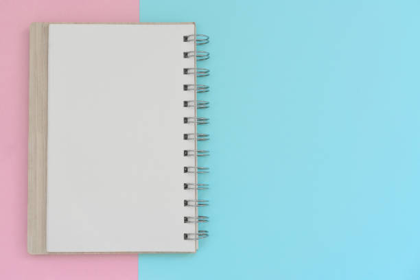 Back to school, education concept -  spiral blank notebook on blue background for educational new academic year begin or study term start. Mock-up Copy space