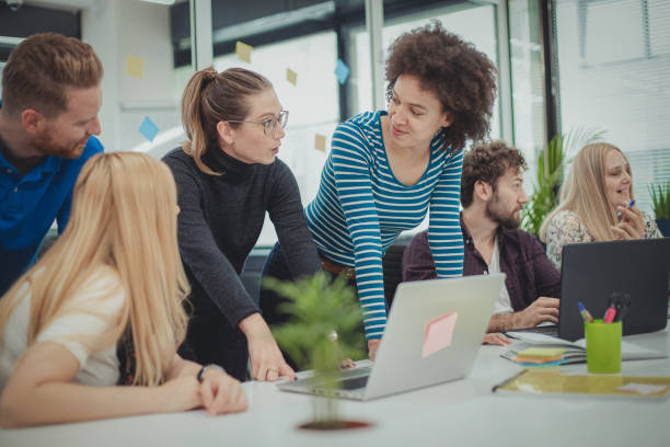 istock Young people in the office 1166900571