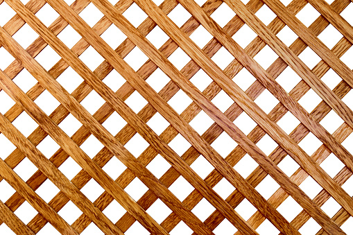 Cross-shaped pattern of oak wood slats. Isolated on white background. Background texture