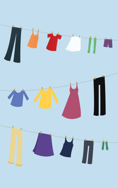 wäsche an einer wäscheleine hängen - laundry clothing clothesline hanging stock-grafiken, -clipart, -cartoons und -symbole