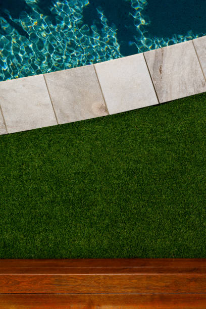 istock Luxury Swimming Pool Detail 1166902134