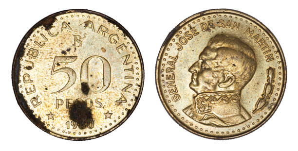 istock Old Argentina coin 50 pesos 1980, front and back faces isolated on white background 1166902195