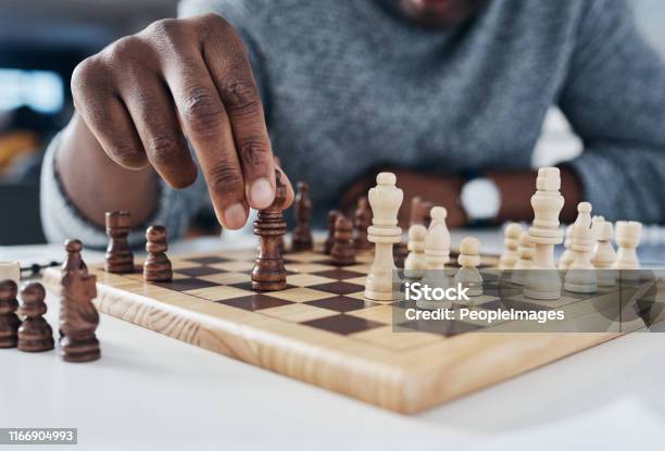 You Only Win By Knowing Your Opponents Next Move Stock Photo - Download Image Now - Chess, Playful, Hand