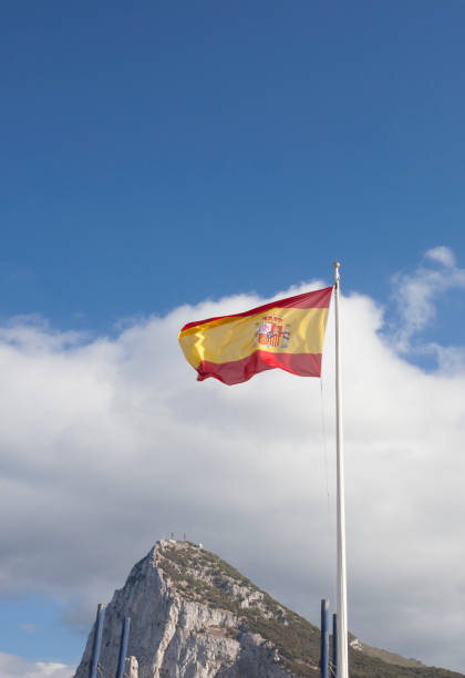istock Spanish flag weaving at Gibraltar border 1166909347