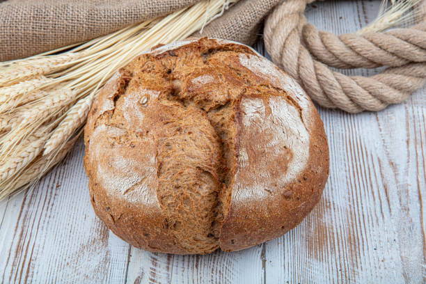 istock Fresh fragrant bread on the table. Food concept 1166924151