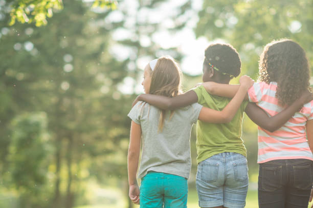 istock Diverse group of friends outside 1166928345