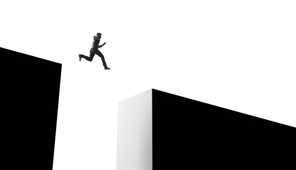 Businessman jumping from obstacles of life Businessman jumping from obstacles of life leap of faith stock pictures, royalty-free photos & images