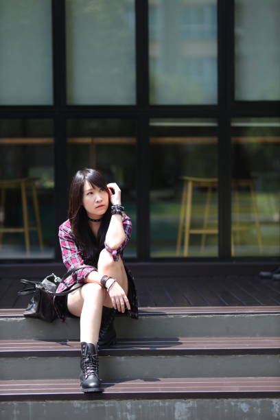 istock cool girl in minimal punk costume 1166932954
