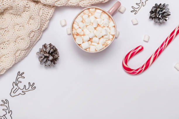 istock Christmas composition with cocoa, marshmallows, knitted sweater and other 1166939608