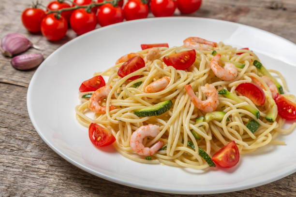 istock Pasta with shrimp and vegetables 1166940517