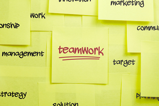 Teamwork Note Papers On The Wall Stock Photo - Download Image Now ...