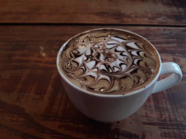 istock Morning hot coffee with random art making 1166943508