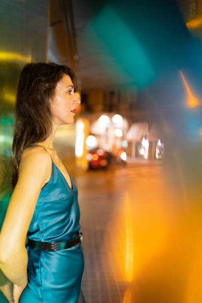 istock Cool woman by colorful wall 1166943524