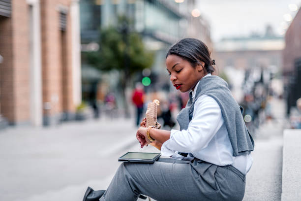 istock African-American businesswoman taking a break 1166944227