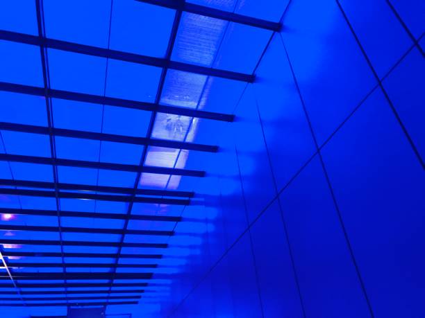 istock Colorful blue neon glass background 1166945243